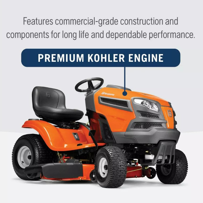 Orange lawn mower with text highlighting premium Kohler engine on a white background