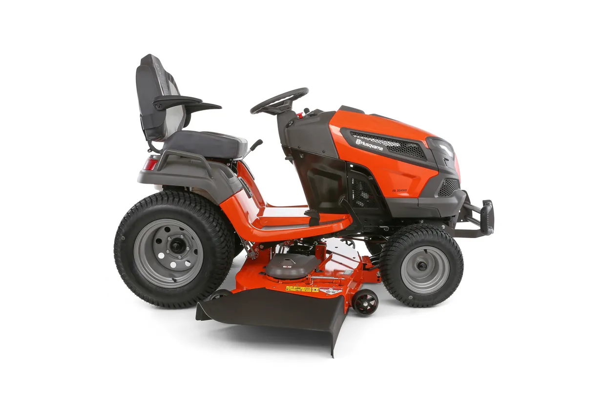 Orange and black riding lawn mower on a white background